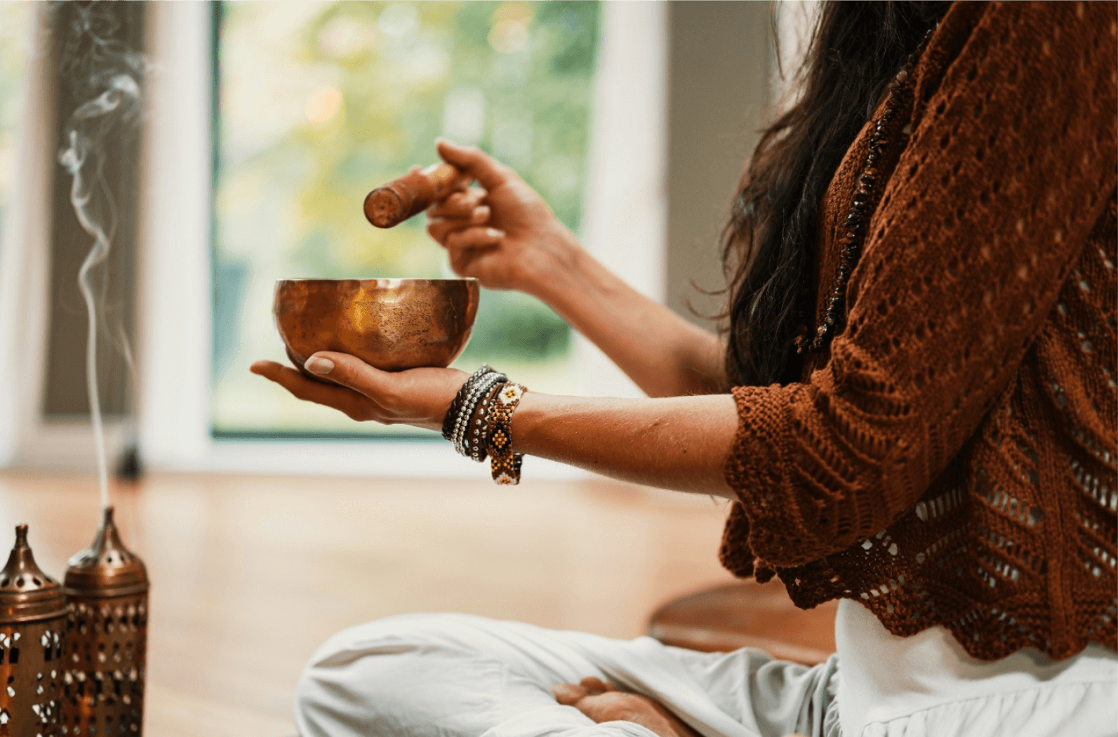 Woman with sound healing bowl